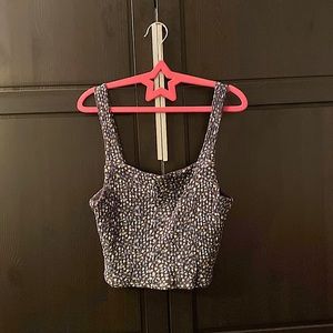 American Eagle black tank top with dark blue/green/yellow flowers in size small